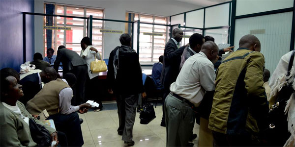 Investors fill application forms during a Nairobi Securities Exchange-listed firm’s past initial public offering in Nairobi. PHOTO | FILE